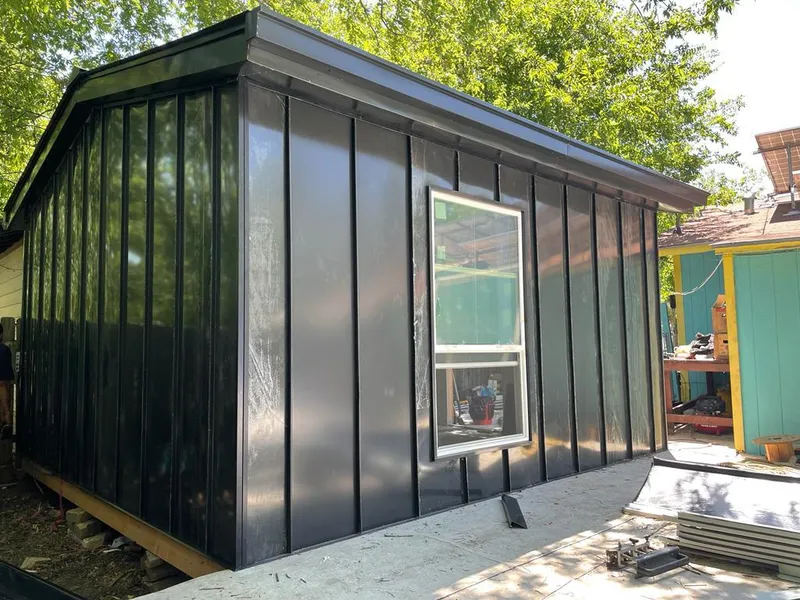 Black standing seam metal wall panels for Metal Roof Installation in Big Flats