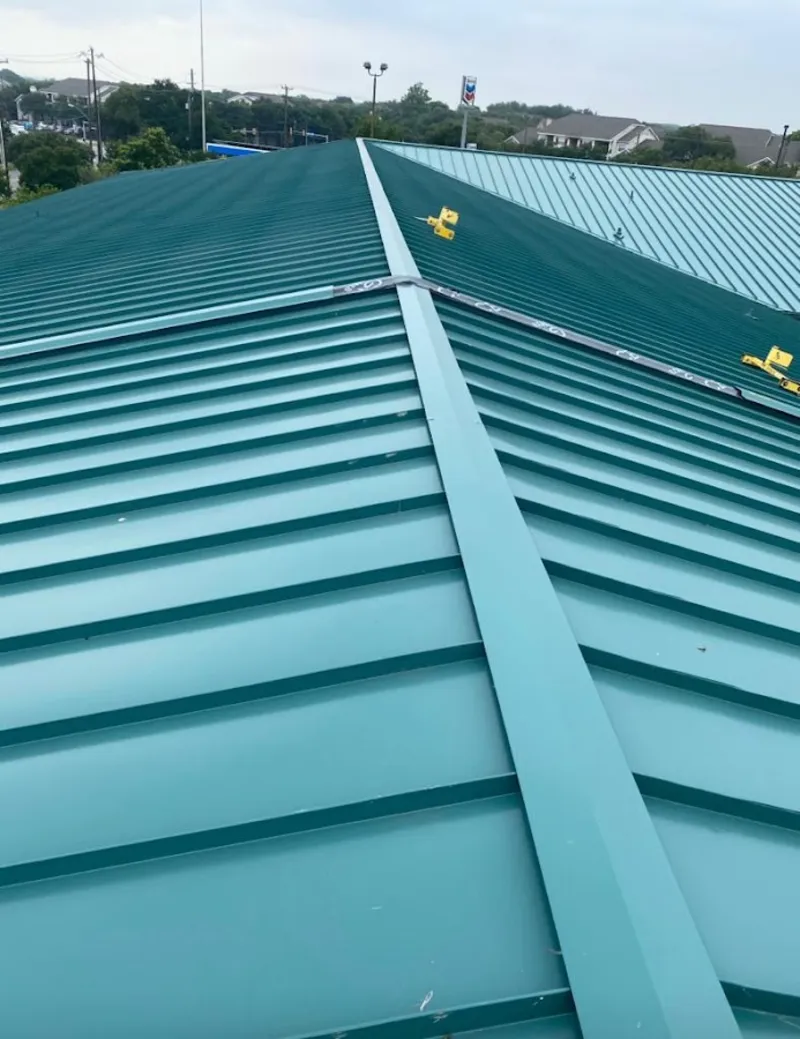 Green commercial metal roof ridge and valley for Metal Roof Repair in Big Flats